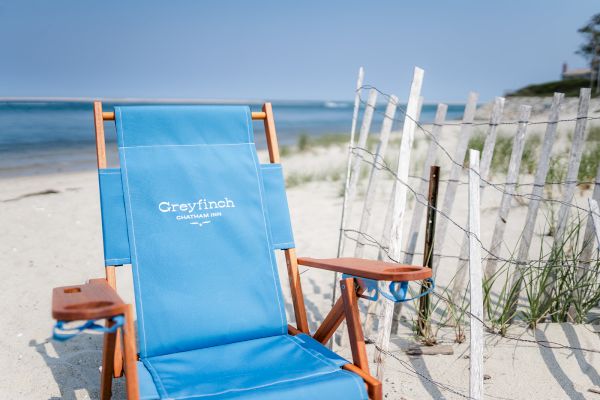 A blue beach chair with 